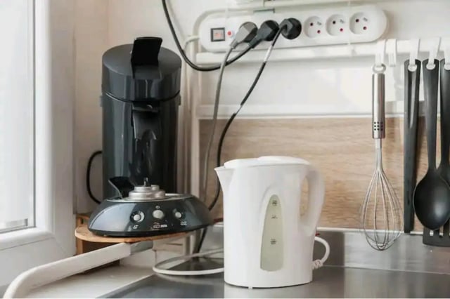 Coffee maker kettle whisk spoons kitchen at Very cosy studio in Berchem in Antwerp Student Accommodation