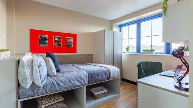 Bed desk wardrobe and window bedroom at Ben Russell Court in Leicester Student Accommodation