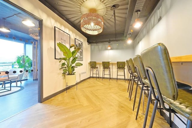 Bar stools and plant area communal area at Canalside in Birmingham Student Accommodation