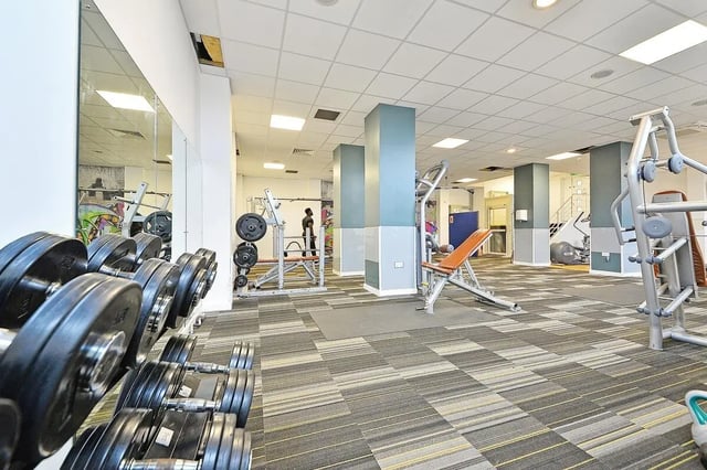 Dumbbell rack weight machines bench gym fitness area at Canalside in Birmingham Student Accommodation