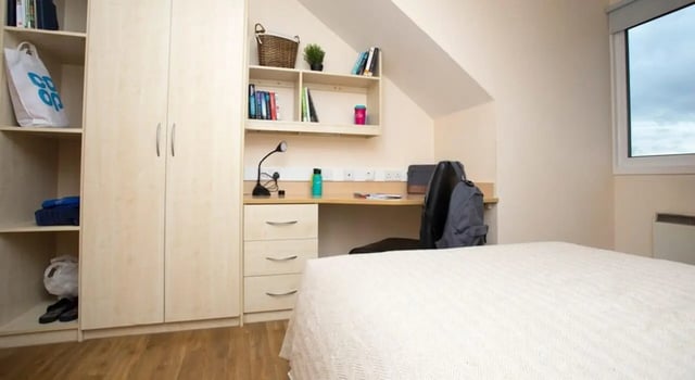 Wardrobe desk chair shelves bed bedroom at Heald Court in Manchester Student Accommodation