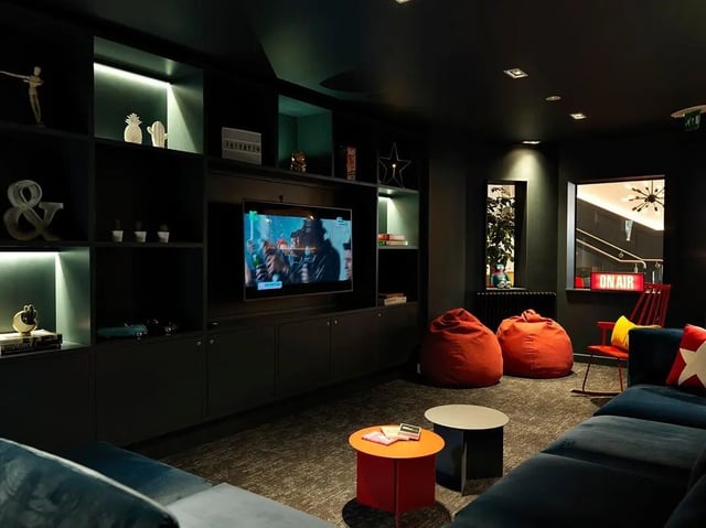 Beanbags television and sofa in a lounge living room at Heald Court in Manchester Student Accommodation