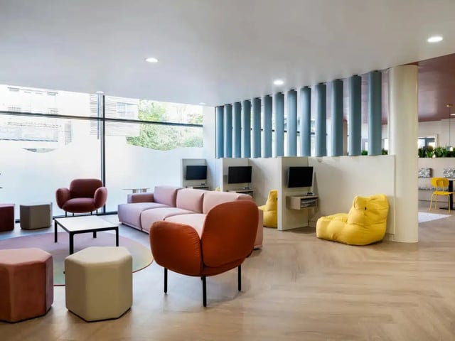 Sofa beanbags computers and seating common area at AXO Kingston in Kingston Upon Thames Student Accommodation