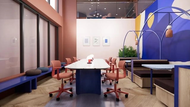 Conference table with chairs and booths common area at Bridge House - Glasgow in Glasgow Student Accommodation