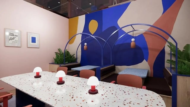 Booths with lamps and art on pink wall lounge at Bridge House - Glasgow in Glasgow Student Accommodation