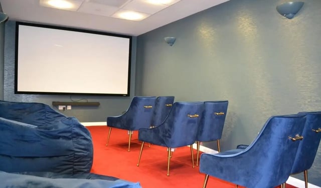Blue beanbags and chairs cinema room at St. Andrew Street in Aberdeen Student Accommodation