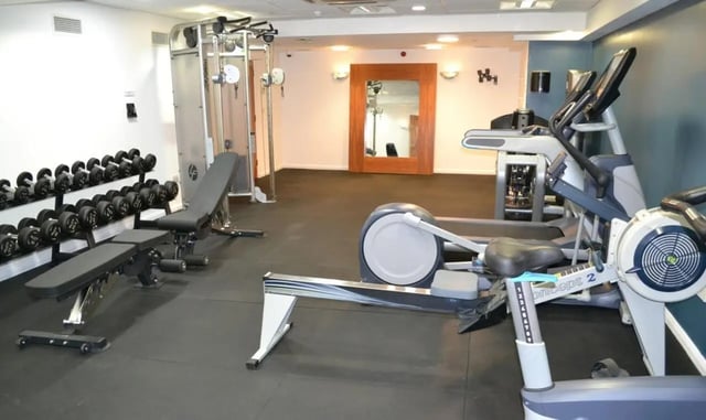 Dumbbells machines benches elliptical rower gym at St. Andrew Street in Aberdeen Student Accommodation
