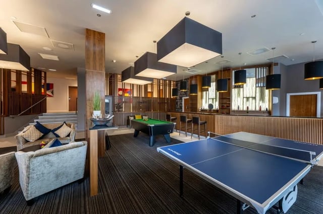 Ping pong table pool table bar area lounge Living room at St. Andrew Street in Aberdeen Student Accommodation