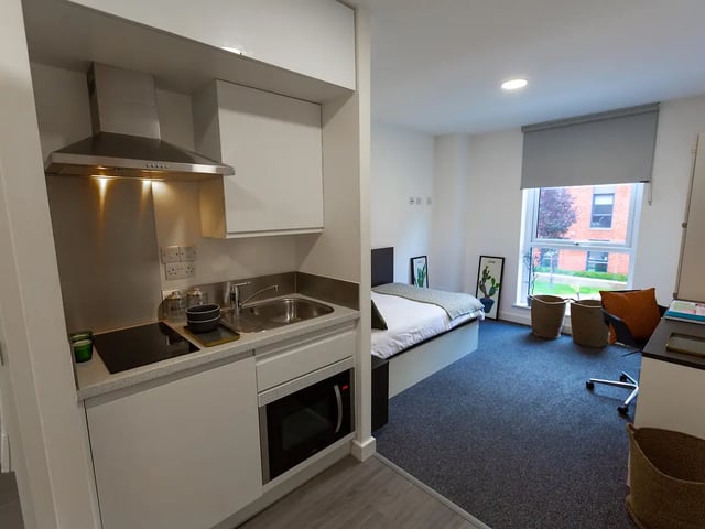 Modern studio kitchen and bedroom area at Canterbury Student Manor in Canterbury Student Accommodation