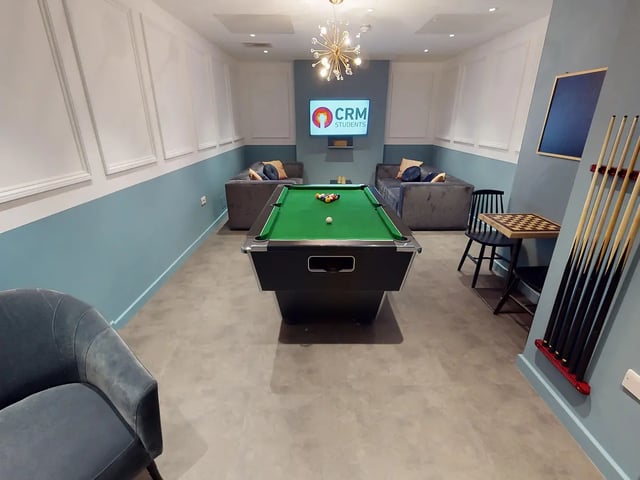 Pool table sofas chessboard playing area at Canterbury Student Manor in Canterbury Student Accommodation