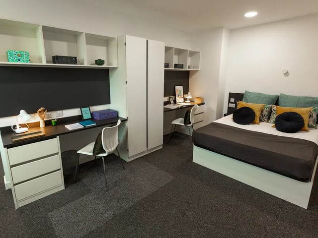 Desk bed storage shelves study area bedroom at Canterbury Student Manor in Canterbury Student Accommodation