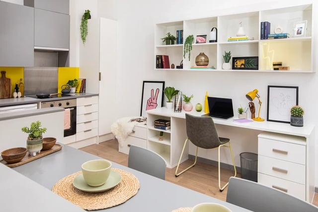 Kitchen desk and shelving area living room at Battery Park in Birmingham Student Accommodation