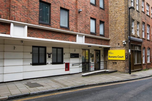 Brick building reception entrance exterior Romano Court exterior at Romano Court in London Student Accommodation