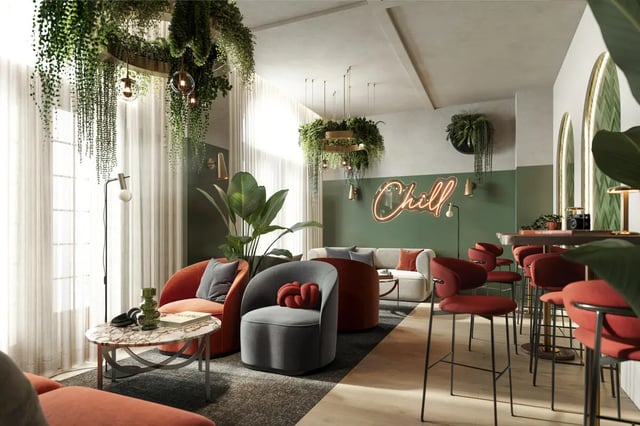 Comfortable seating plants neon sign living area at Yugo Rothesay House in Bournemouth Student Accommodation