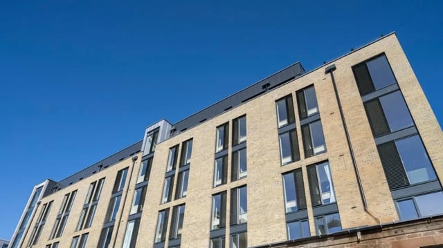Modern brick building with many windows exterior at Parklands in Dundee Student Accommodation