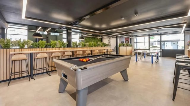 Pool table ping pong table bar area lounge at Clarence Dock Village in Leeds Student Accommodation