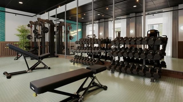 Dumbbell racks weight machines workout benches fitness gym at The Propeller Quarter in Bristol Student Accommodation