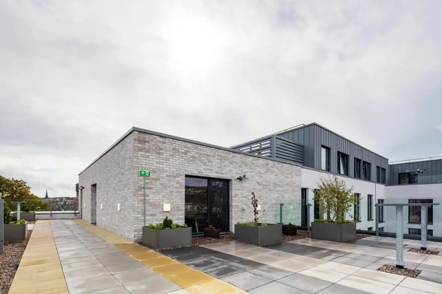 Modern building exterior with planters and walkway exterior at Coleman Court in Cork Student Accommodation