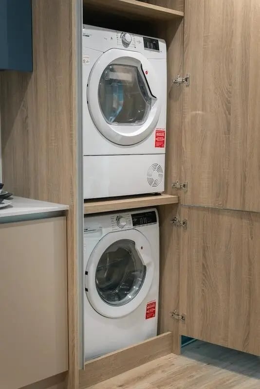Stacked washing machine and dryer interior at The Artisan in Dublin Student Accommodation