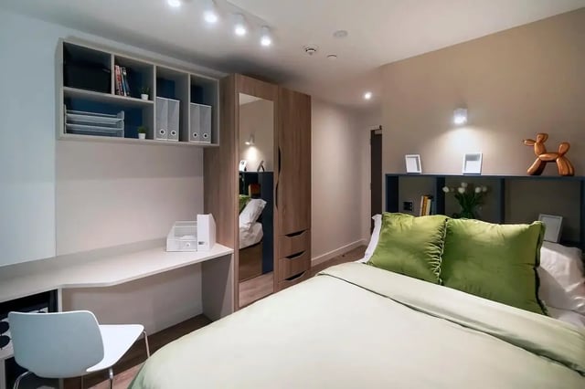 Desk shelves wardrobe bed and chair bedroom at The Artisan in Dublin Student Accommodation
