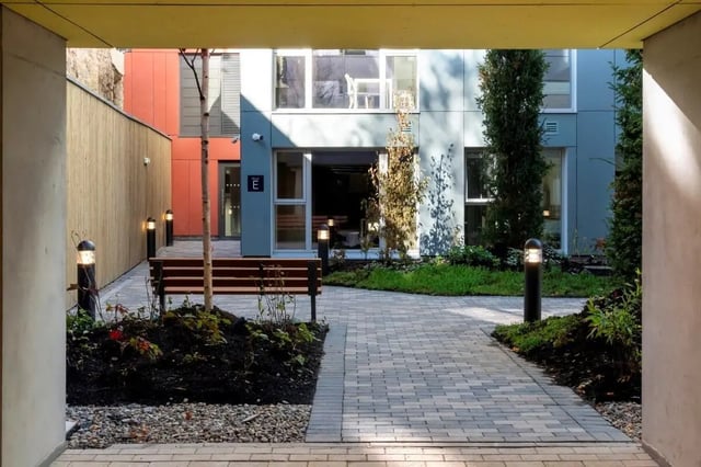 Bench pathway lights building exterior at The Artisan in Dublin Student Accommodation