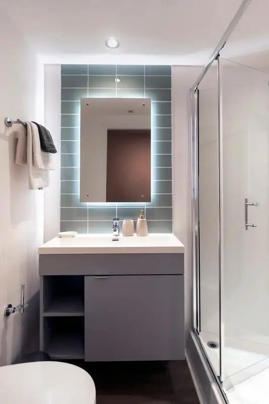 Modern vanity sink with illuminated mirror shower bathroom at The Artisan in Dublin Student Accommodation