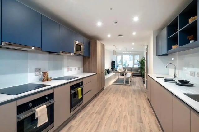 Modern kitchen with ovens and living room kitchen at The Artisan in Dublin Student Accommodation