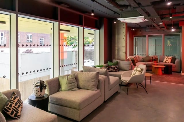 Sofa sectional chairs and plant living room at The Artisan in Dublin Student Accommodation