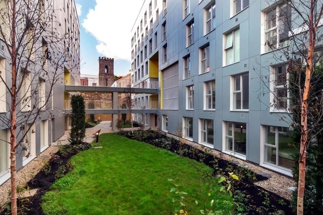 Modern buildings with courtyard and green space exterior at The Artisan in Dublin Student Accommodation