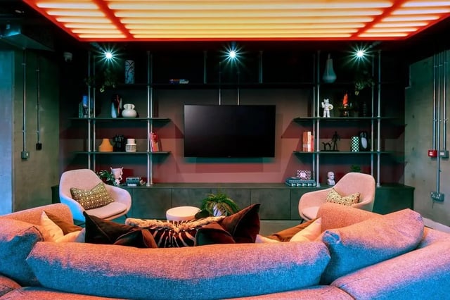 Circular sectional sofa and armchairs in living area at The Artisan in Dublin Student Accommodation
