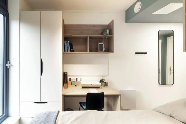 Wardrobe desk chair shelves mirror student bedroom at Bradbury Place in Belfast Student Accommodation