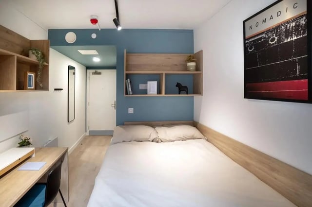 Bed desk shelves mirror door bedroom at Bradbury Place in Belfast Student Accommodation