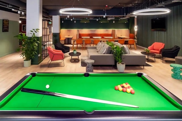 Pool table lounge and seating area with plants at Bradbury Place in Belfast Student Accommodation
