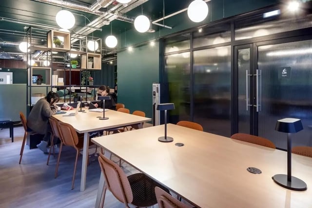 Modern study area with students and gym doors at Stoneybatter Place in Dublin Student Accommodation