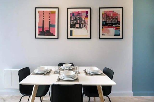 Dining table with place settings and chairs living room at Stoneybatter Place in Dublin Student Accommodation