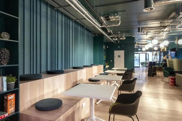 Seating area with tables and chairs lounge area at Stoneybatter Place in Dublin Student Accommodation