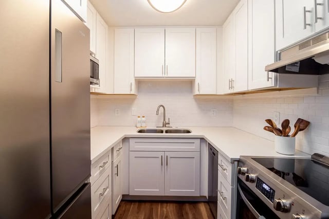 Refrigerator sink stove and cabinets kitchen at Union on Bellevue in Tucson Student Accommodation