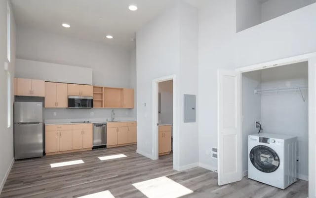 Kitchen appliances washer dryer laundry area at Ace Apartments in Seattle Student Accommodation