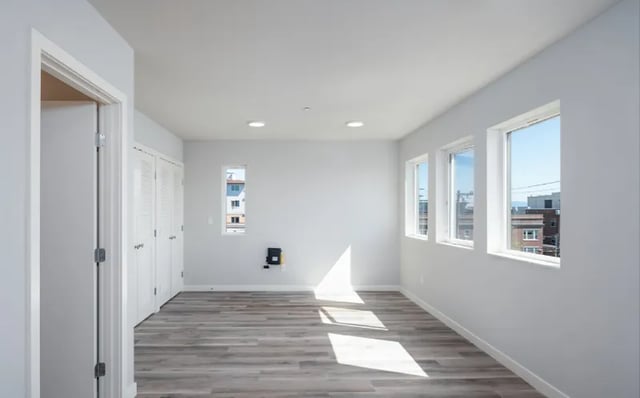 Closets and multiple windows view living room at Ace Apartments in Seattle Student Accommodation