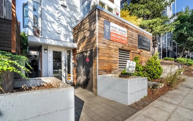 Entrance with signage and planter boxes exterior at Ace Apartments in Seattle Student Accommodation