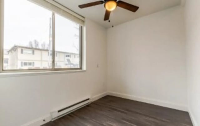 Window ceiling fan white walls dark floor bedroom at Victory East Lansing in East Lansing Student Accommodation