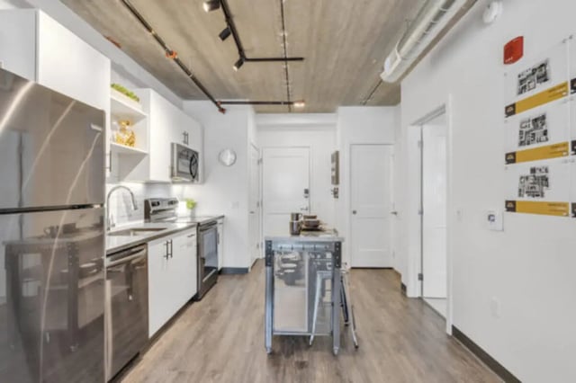 Modern kitchen with island and appliances kitchen at The Bridge on Forbes Apartments in Pittsburgh Student Accommodation