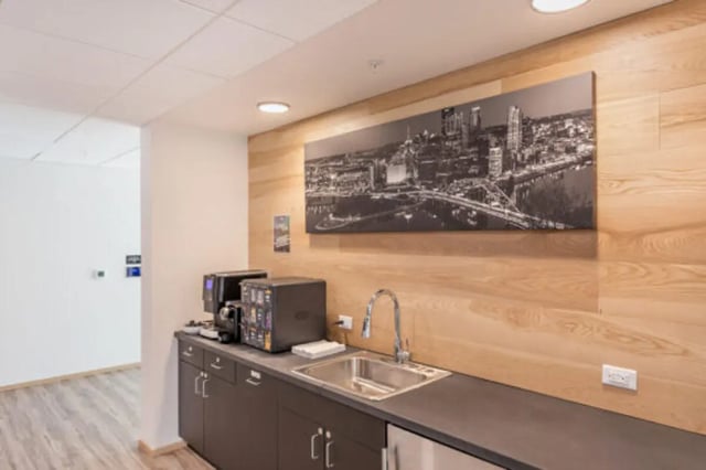 Coffee machines sink and cityscape artwork Kitchen at The Bridge on Forbes Apartments in Pittsburgh Student Accommodation