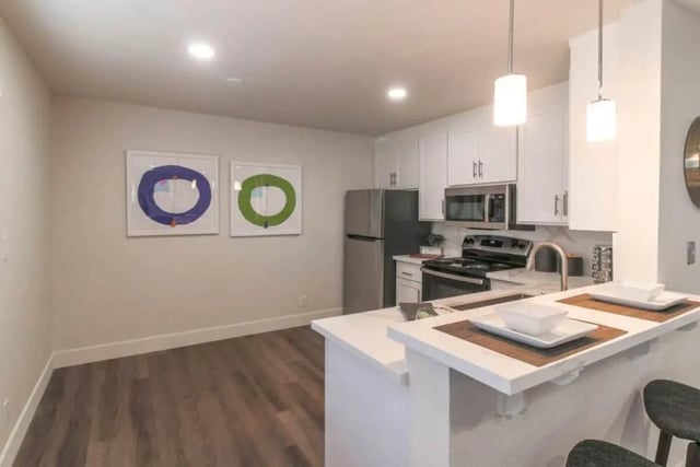 Modern kitchen with two framed art pieces kitchen at Aero Apartments in Davis Student Accommodation