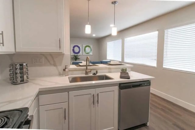 Kitchen with sink and dishwasher kitchen at Aero Apartments in Davis Student Accommodation