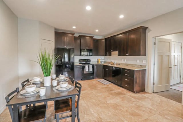 Dining table chairs plant and kitchen area kitchen at CollegePlace Woodland in Provo Student Accommodation