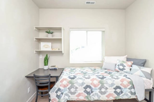 Bed desk shelves and chair bedroom at CollegePlace Woodland in Provo Student Accommodation