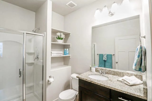 Shower toilet vanity shelves towels bathroom at CollegePlace Woodland in Provo Student Accommodation