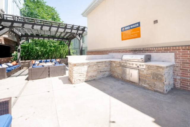 Grill and seating area exterior at CollegePlace Woodland in Provo Student Accommodation