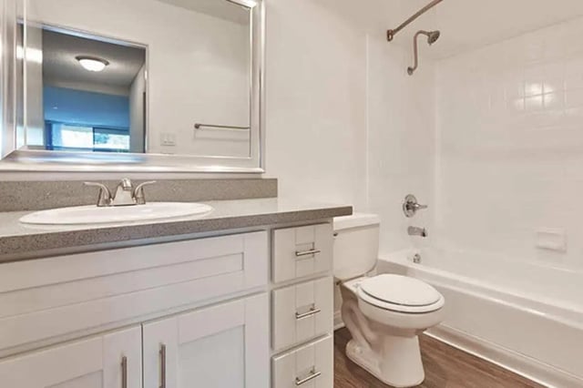 Sink toilet bathtub with shower bathroom at Ariel Court in Los Angeles Student Accommodation